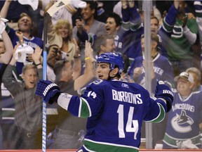 Alex Burrows celebrates a goal against the Boston Bruins during Game 2 of the Stanley Cup Final in 2011.