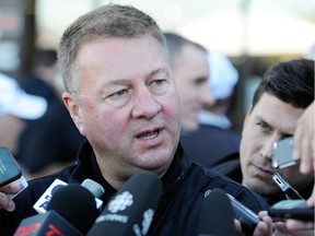 Vancouver Canucks president and general manager Mike Gillis speaks to the media in 2012.