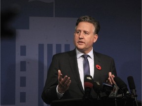 Vancouver Mayor Kennedy Stewart talks to media following a council meeting at Vancouver City Hall.