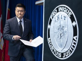 IHIT Spokesperson Cpl. Frank Jang steps up to the podium for the start of a press conference RCMP "E" Division headquarters in Surrey, December, 2, 2019.