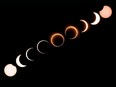 This composite image shows the moon as it moves in front of the sun in a rare "ring of fire" solar eclipse as seen from Tanjung Piai in Malaysia, Thursday, Dec. 26, 2019.