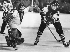 Goaltender John Garrett of the Vancouver Canucks makes a highlight-reel toe save against Pittsburgh Penguins' Andy Brickley in 1984, but during a game in 1983 he was beat for nine goals in a less-than-pretty 10-9 win.
