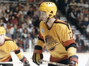Patrik Sundstrom lines up for a faceoff during the 1985-86 NHL season at the Pacific Coliseum — note the Expo 86 patch on near his right shoulder. Sundstrom had a team-leading 48 assists that season for the Canucks.