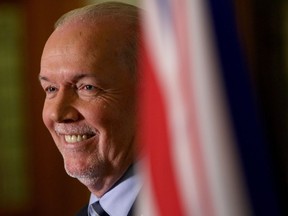 Premier John Horgan answers questions at a press conference in the Hall of Honour at B.C. Legislature in Victoria, B.C., on Monday, October 7, 2019. Horgan says it's the best of times for cannabis users in British Columbia, but they could be even better.