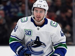 ANAHEIM, CALIFORNIA - NOVEMBER 01:  Quinn Hughes #43 of the Vancouver Canucks skates during a 2-1 Anaheim Ducks win at Honda Center on November 01, 2019 in Anaheim, California. (Photo by Harry How/Getty Images) ORG XMIT: 775375713 [PNG Merlin Archive]