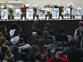 People gather at the University of Manitoba for a vigil organized by the University of Manitoba Iranian Students Association (UMISA) for the Winnipeg victims killed in a plane crash in Iran in Winnipeg Friday, January 10, 2020.