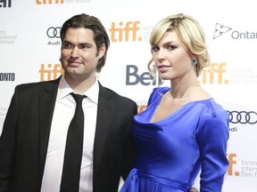 Co-director Drew Taylor, and executive producer Elena Semikina are shown when they arrived on the red carpet for 'Our Man in Tehran', during the Toronto International Film Festival in Toronto on Sept. 12, 2013. (Veronica Henri, Toronto Sun)