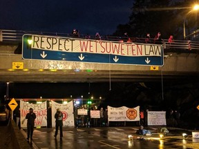 Demonstrators set up a blockade of Highway 17, which leads to B.C. Ferries’ Swartz Bay terminal, in support of Wet'suwet'en hereditary leaders against the Coastal GasLink pipeline, on Monday.
