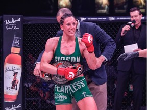Port Moody's Julia Budd earned a split decision against Arlene Blencowe at Bellator 189 in Thackerville, Okla., where she retained the Bellator MMA featherweight title.