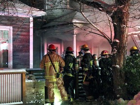 Icy roads caused problems for Vancouver firefighters contending with a two-alarm house fire in Strathcona on Monday nigh