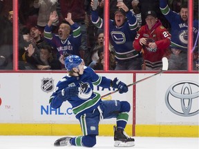 Adam Gaudette of the Vancouver Canucks celebrates his game-winning goal against the Chicago Blackhawks on Thursday at Rogers Arena in Vancouver.