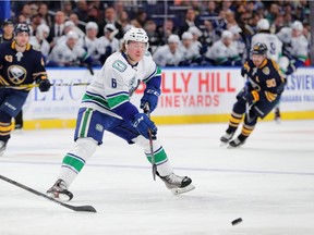 Vancouver Canucks right wing Brock Boeser (6) makes a pass during the first period against the Buffalo Sabres at KeyBank Center.