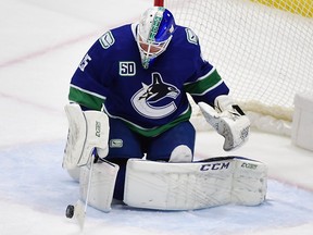 Vancouver Canucks goaltender Jacob Markstrom blocks a shot on net by the Chicago Blackhawks during the first period at Rogers Arena.