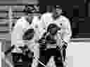 Russians Igor Larionov and Pavel Bure, pictured during a February 1992 Canucks practice, were only teammates for one season — Bure’s rookie campaign, for which he won the 1991-92 Calder Trophy as the NHL’s top freshman.