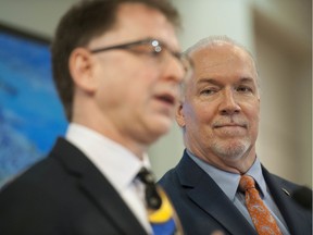 B.C. health minister Adrian Dix with premier John Horgan.