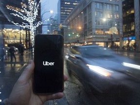 The Uber App is pictured on a smartphone in downtown Vancouver.