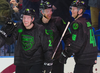 Olli Juolevi (right) celebrates with his Utica teammates after Brogan Rafferty (left) scored a goal in early January.