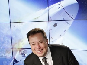 SpaceX founder and chief engineer Elon Musk reacts at a post-launch news conference to discuss the SpaceX Crew Dragon astronaut capsule in-flight abort test at the Kennedy Space Center in Cape Canaveral, Florida, U.S. January 19, 2020.