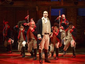 Broaway hit Hamilton will come to Vancouver in the summer of 2021. This image released by The Public Theater shows Lin-Manuel Miranda, foreground, with the cast during a performance of "Hamilton," in New York.