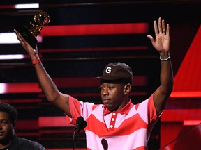 Tyler, the Creator accepts the award for Best Rap Album during the 62nd Annual Grammy Awards.