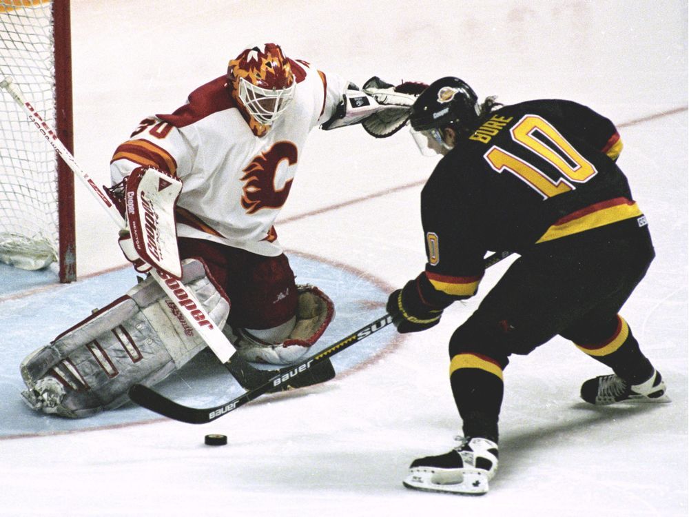 On this day in 1994, Vancouver Canucks' Pavel Bure hits 50-goal mark for  second straight season