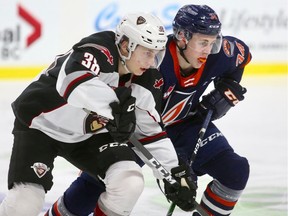 Vancouver Giants' Michal Kvasnica, left, in action against the Kamloops Blazers.