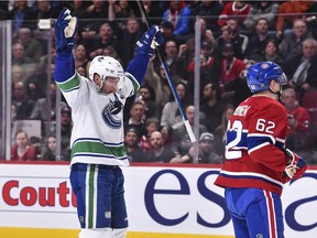 Bo Horvat celebrates his power-play goal to help ignite rally Tuesday.