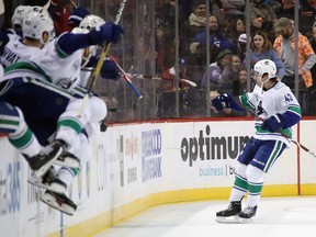 Quinn Hughes #43 of the Vancouver Canucks celebrates his game winning goal in overtime against the New York Islanders at the Barclays Center on February 01, 2020 in the Brooklyn borough of New York City.