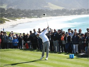 Nick Taylor of Canada plays his shot from the 14th tee during the final round of the AT&T Pebble Beach Pro-Am at Pebble Beach Golf Links on February 09, 2020 in Pebble Beach, California.
