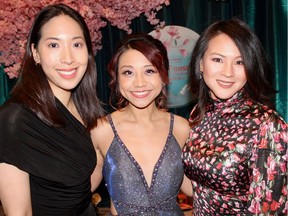 RECORD FEAST: Committee members Diana Choi, Cheryl Kwok and Kristen Lai welcomed guests to the 13th Scotiabank Feast of Fortune fundraiser for St. Paul’s Hospital Foundation.