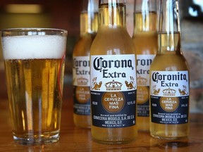 In this photo illustration, bottles of Corona beer are shown on June 7, 2013 in Chicago, Illinois.