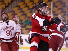 Adam Gaudette of Northeastern University reacts after scoring against Harvard University during the Beanpot Tournament consolation game at TD Garden on Feb. 8, 2016, in Boston.
