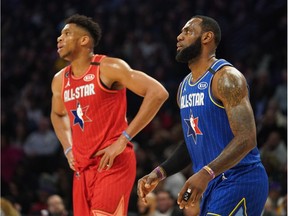 Team Giannis forward Giannis Antetokounmpo (left) of the Milwaukee Bucks and Team LeBron forward LeBron James of the Los Angeles Lakers during the 2020 NBA All Star Game at United Center in Chicago on Feb. 16, 2020.