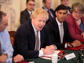 Britain's Prime Minister Boris Johnson chairs his first meeting of the cabinet the day after a reshuffle at 10 Downing Street in London on Feb. 14, 2020.