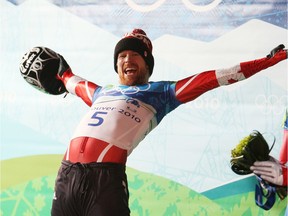 Canadian skeleton athlete Jon Montgomery celebrates his gold medal performance after his final run at the The Whistler Sliding Centre in Whistler during the 2010 Olympic Games, Friday February 19, 2010.
