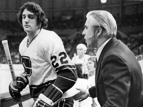 Vancouver Canucks Gregg Boddy, left, and coach Phil Maloney in 1974. Maloney died this week at the age of 92.