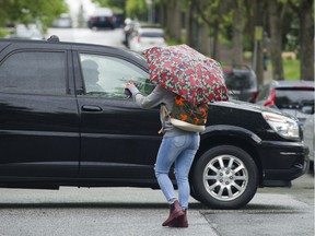 VANCOUVER May 14 2019. Pedestrians and cars mix at a residential street intersection in east Van, Vancouver May 14 2019. ( Gerry Kahrmann / PNG staff photo) 00057405A Story by Dan Fumano [PNG Merlin Archive]