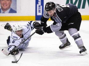 Tristen Nielsen of the Vancouver Giants, right, has improved his game this year and can't wait to flex his muscle against the Calgary Hitmen on Friday at Langley Events Centre.