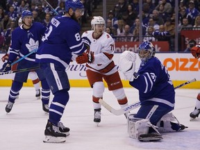 A shot by Carolina Hurricanes forward Nino Niederreiter (not pictured) scores on Toronto Maple Leafs goaltender Frederik Andersen as defenseman Jake Muzzin and Carolina Hurricanes forward Lucas Wallmark look on during the second period at Scotiabank Arena.