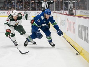 Can the Vancouver Canucks afford to keep both Jake Virtanen, right, and Troy Stecher, who are in line for raises next season from $1.25 million and $2.325 million, respectively?