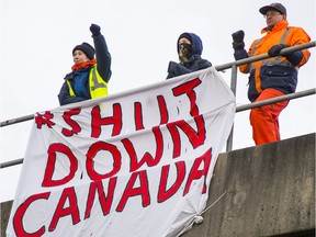 Protesters set up a rail blockade in Port Coquitlam on Friday in support of Wet'suwet'en hereditary chiefs opposed to a natural gas pipeline on their traditional territory, one of dozens of protests and blockades across Canada in recent days.