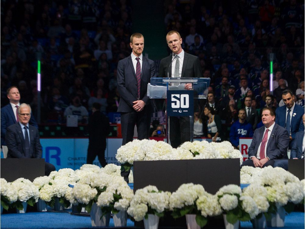 Canucks retire the Sedin twins' jerseys 