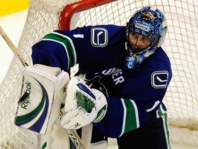 Vancouver Canucks' goalie Roberto Luongo makes one of his 28 saves against the Phoenix Coyotes  at GM Place on Nov. 6, 2008.