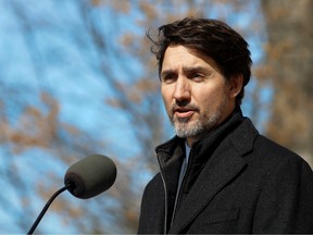 Canada's Prime Minister Justin Trudeau speaks to the media outside his home in Ottawa, Ontario, Canada March 16, 2020.