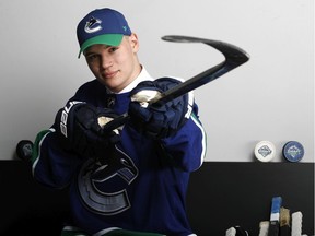 Vasili Podkolzin poses for a portrait after being selected tenth overall by the Vancouver Canucks during the first round of the 2019 NHL Draft at Rogers Arena on June 21, 2019 in Vancouver, Canada.