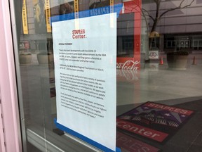 Los Angeles, California, USA;  A notice posted informing the public that all activity at Staples Center is postponed or cancelled due to the coronavirus COVID-19 pandemic.
