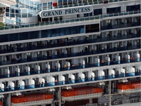 The cruise ship Grand Princess docks at the Port of Oakland as authorities prepare for passenger debarkation after 21 people on board tested positive for the coronavirus.