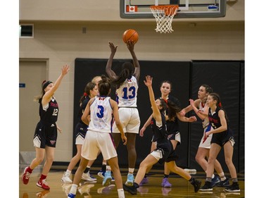 Semiahmoo Totems #13 Deja Lee has the ball at the B.C. high school basketball provincials at the Langley Events Centre, Feb. 29, 2020.  Photo credit: Francis Georgian   /  PNG staff
