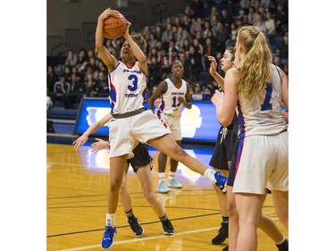 Semiahmoo Totem #3 Raushan Bindra has the ball at the high school basketball provincials at the Langley Events Centre, Feb. 29, 2020. Photo credit: Francis Georgian / Postmedia) ,