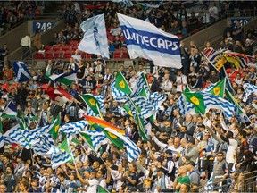 A B.C. Place Stadium packed with Vancouver Whitecaps fans in earlier, pre-pandemic times. The MLS club could be coming home to play on the stadium pitch as soon as Aug. 21. The team is returning to Vancouver at the end of July, and is awaiting a National Interest Exemption to host games in its home dome.